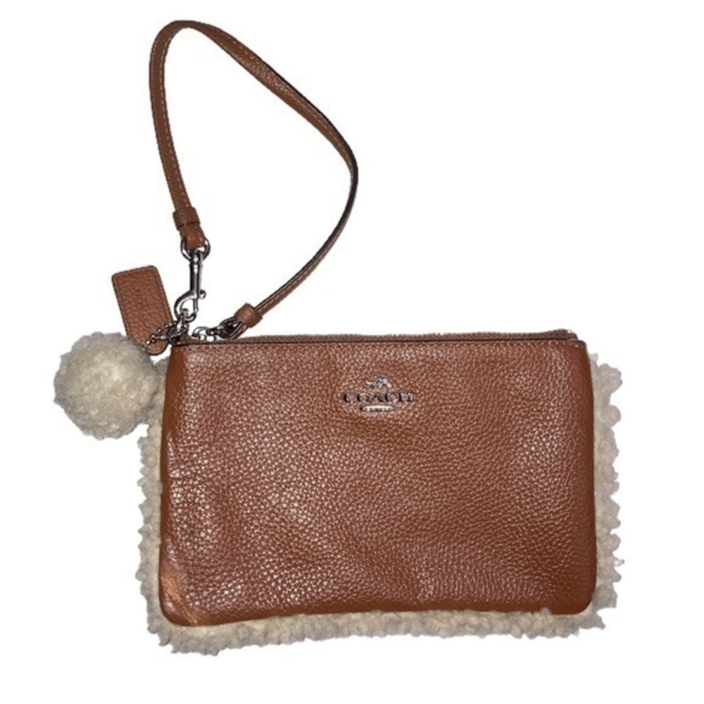 Coach brown leather shearling trimmed wristlet bag